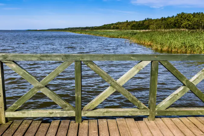 Wooden pier on big lake Lebsko in Poland.
